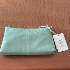 HOBO Green Leather Hobo Bag with Minimalist Design